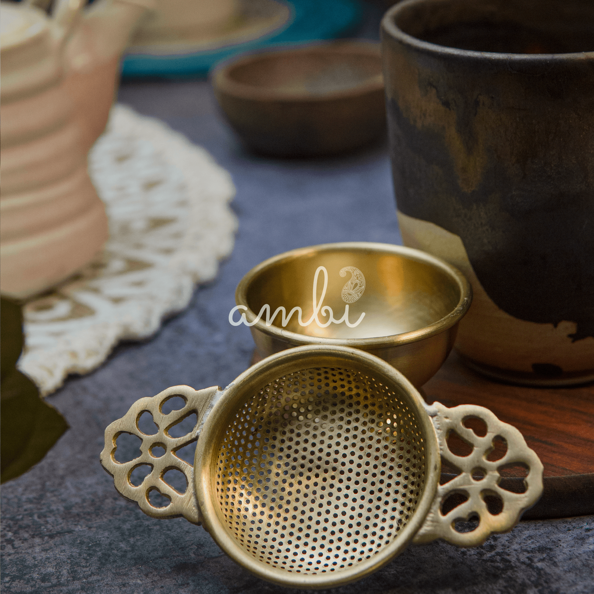 Double Punched Flower Brass Medium Sized Tea Strainer with Matte Finish and Resting Pot - Gold