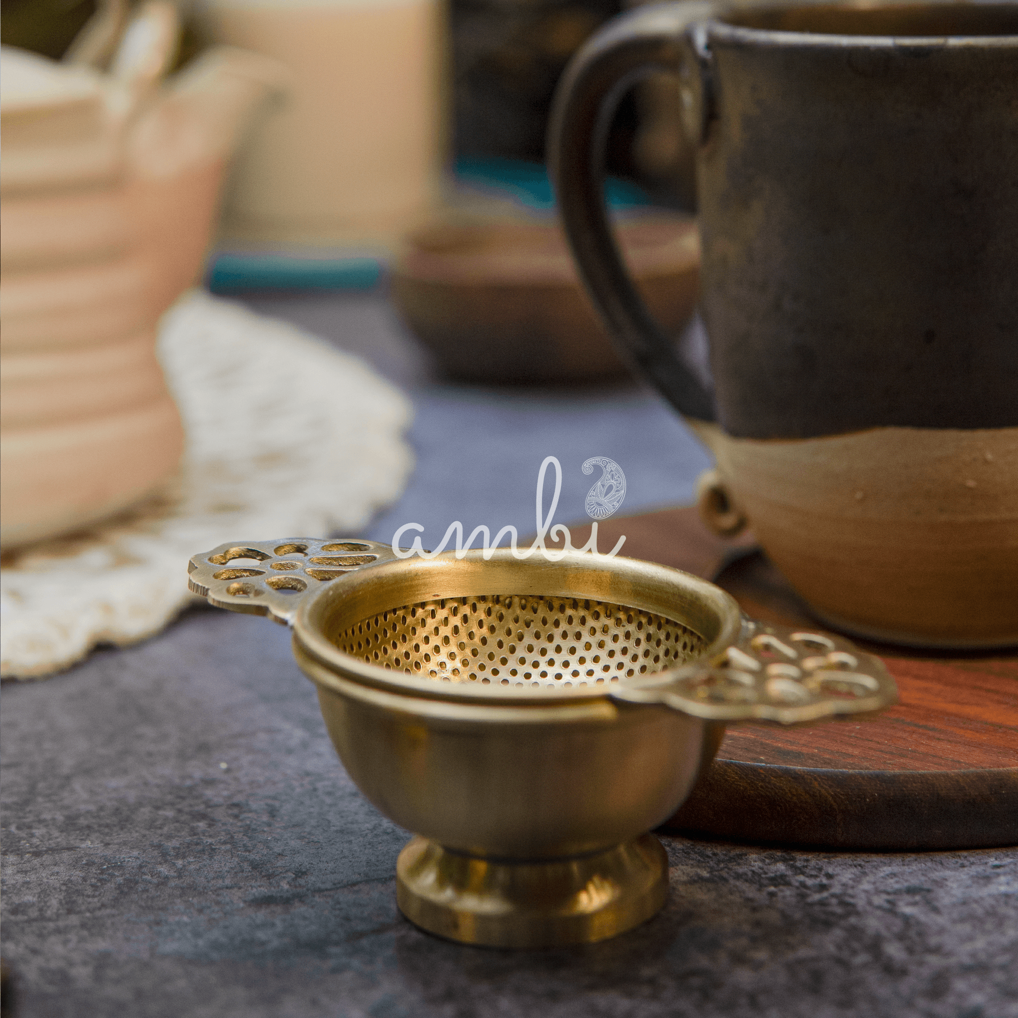 Double Punched Flower Brass Medium Sized Tea Strainer with Matte Finish and Resting Pot - Gold