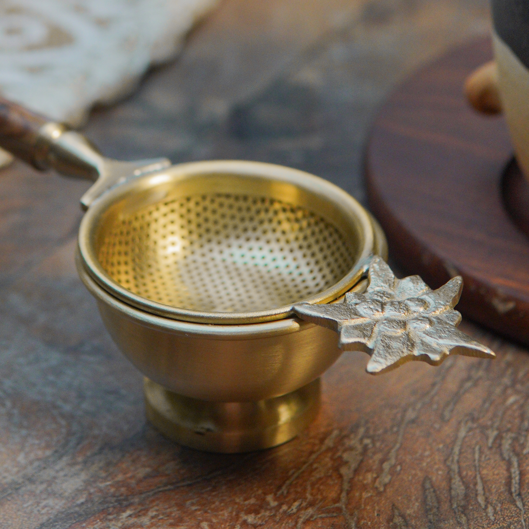 Gold Flower Matte Finish Brass Medium Sized Tea Strainer 2 Piece Set With Wooden Holder and Resting Pot
