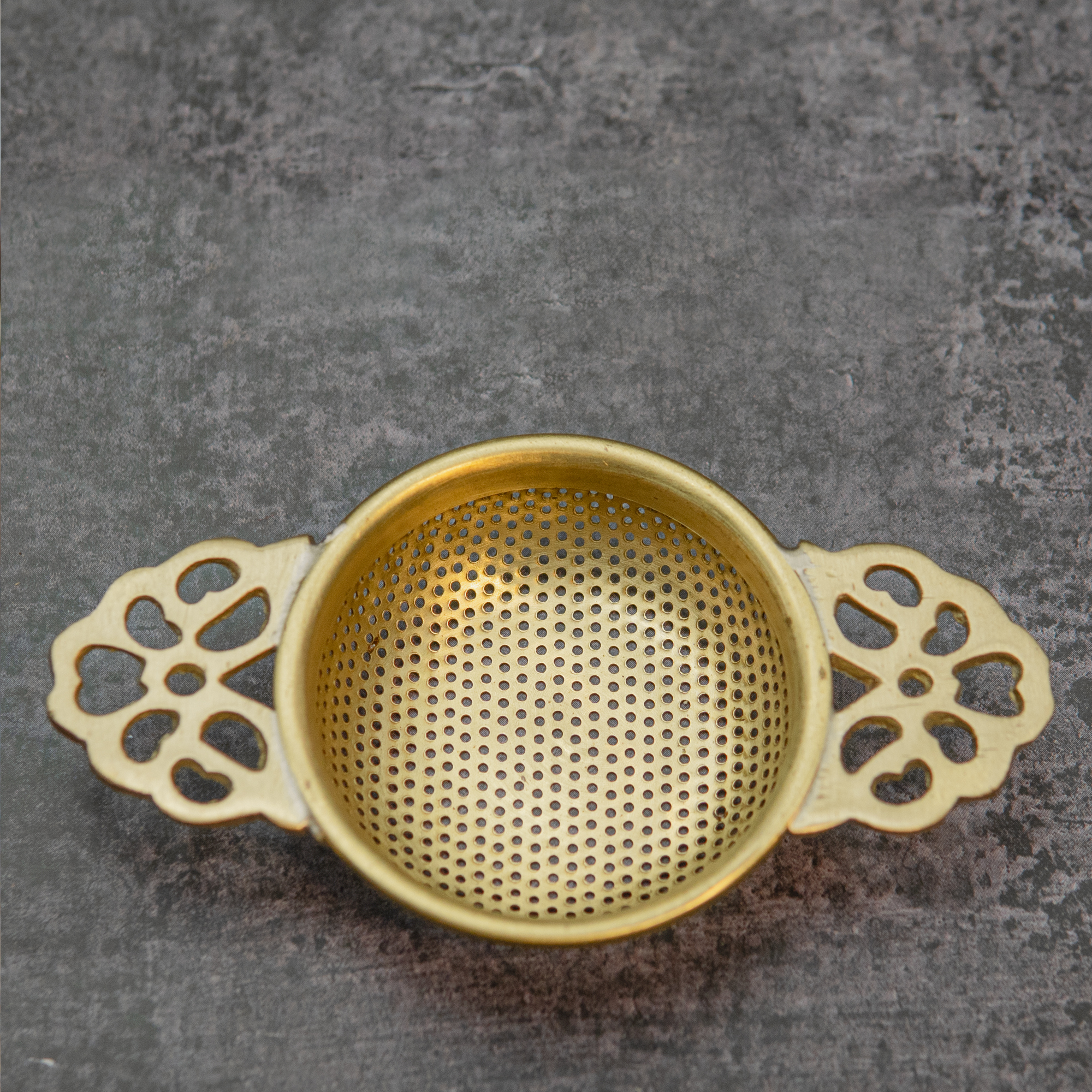 Double Punched Flower Brass Medium Sized Tea Strainer with Matte Finish and Resting Pot - Gold
