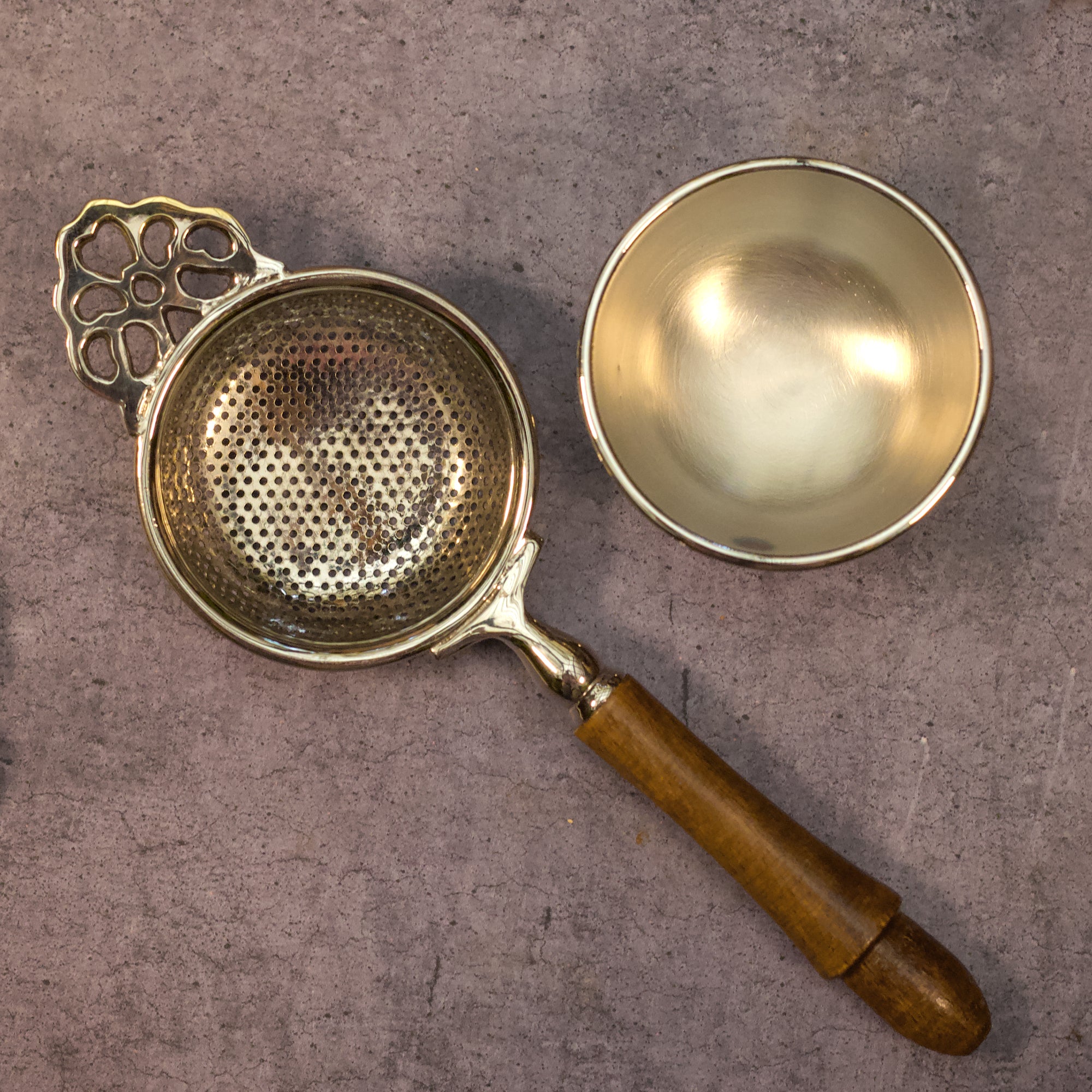 Pure Brass Punched Flower Medium Sized Tea Strainer - Gold Matte Finish With Wooden Handle and Resting pot