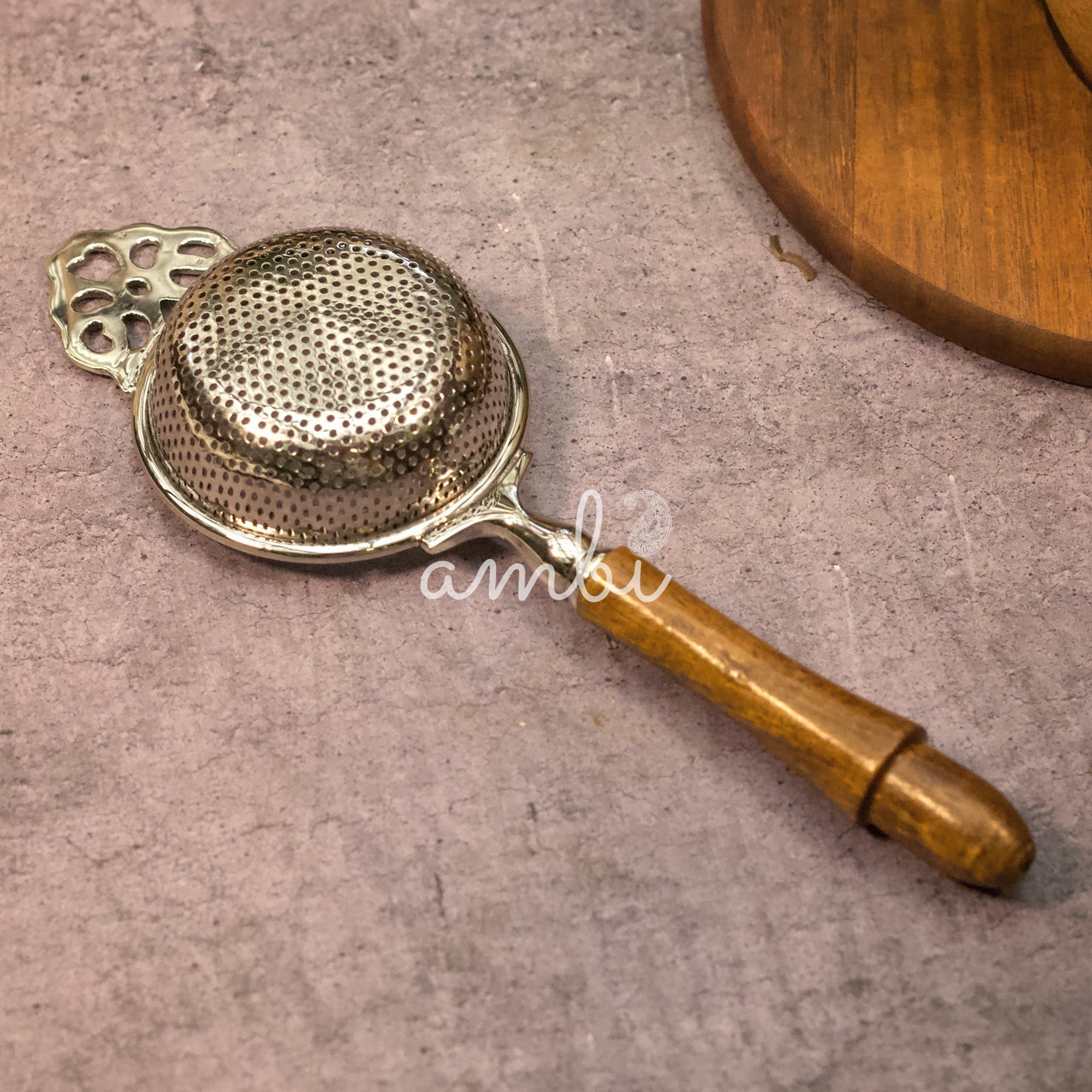 Pure Brass Punched Flower Medium Sized Tea Strainer - Gold Matte Finish With Wooden Handle and Resting pot