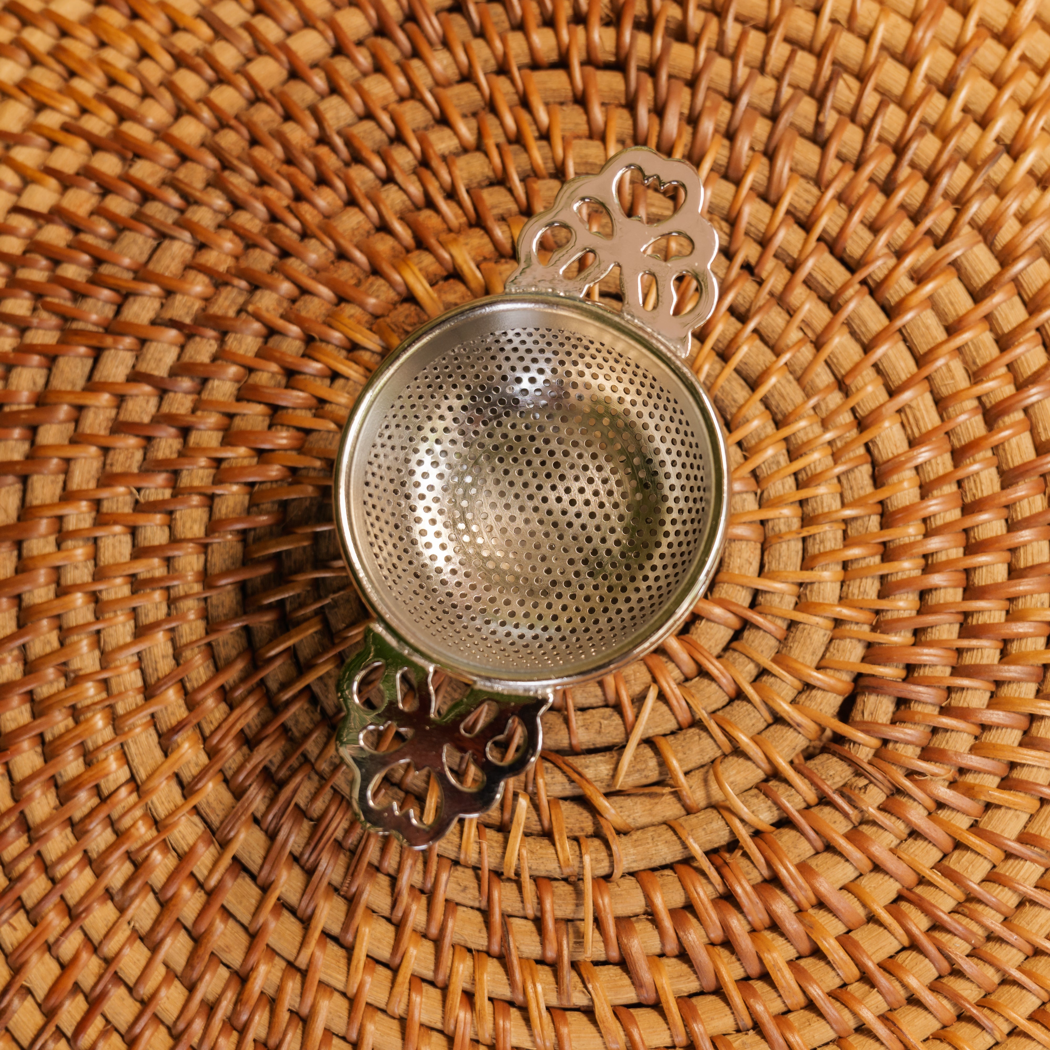 Double Punched Flower Brass Medium Sized Tea Strainer with Matte Finish and Resting Pot - Silver