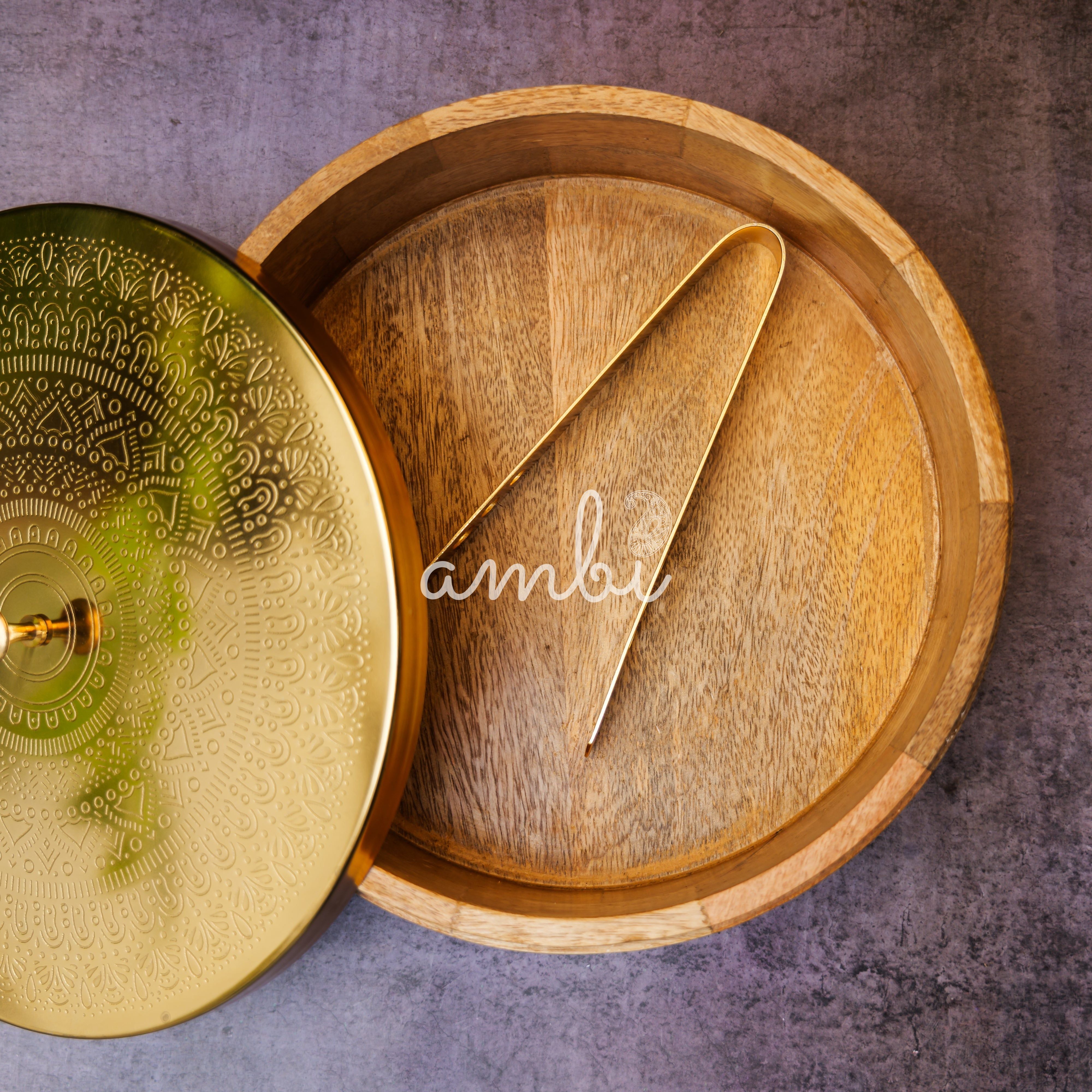 Ambi Pure Brass Mandala Roti Box with Wooden Base and Tongs - 9 Inche