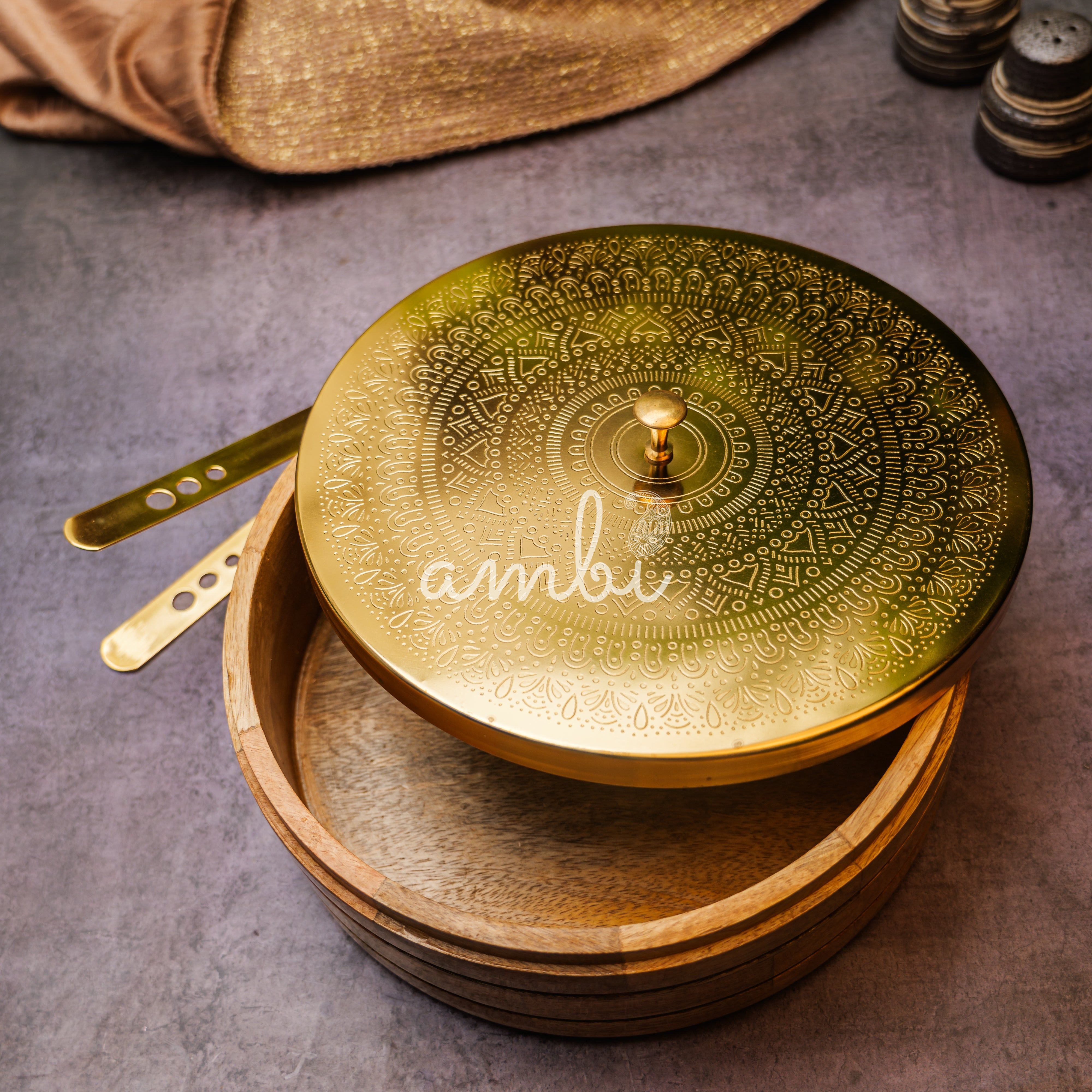 Ambi Pure Brass Mandala Roti Box with Wooden Base and Tongs - 9 Inche