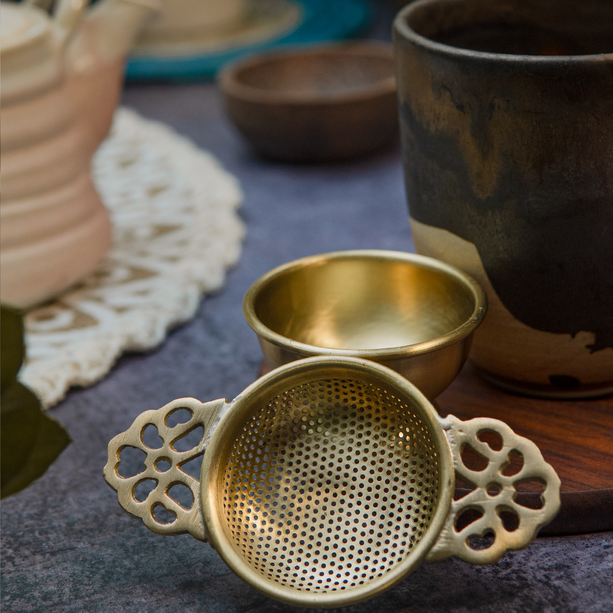 Double Punched Flower Brass Medium Sized Tea Strainer with Matte Finish and Resting Pot - Gold